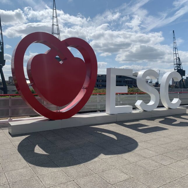Signage of a red heart positioned next to the the letters "E" S" "C"